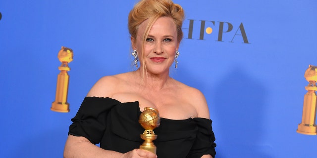 Patricia Arquette poses in the press room with the award for best performance by an actress in a limited series or a motion picture made for television for "Escape at Dannemora" at the 76th annual Golden Globe Awards at the Beverly Hilton Hotel on Sunday, Jan. 6, 2019, in Beverly Hills, Calif. (Photo by Jordan Strauss/Invision/AP)