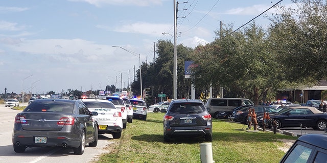 At least five people were killed at a bank in Florida on Wednesday after a suspect claimed to dispatch that he’d opened fire inside, authorities said.