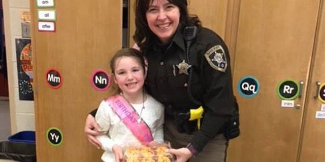 A sheriff's deputy bought cupcakes for a little girl after hers were destroyed in a car wreck.