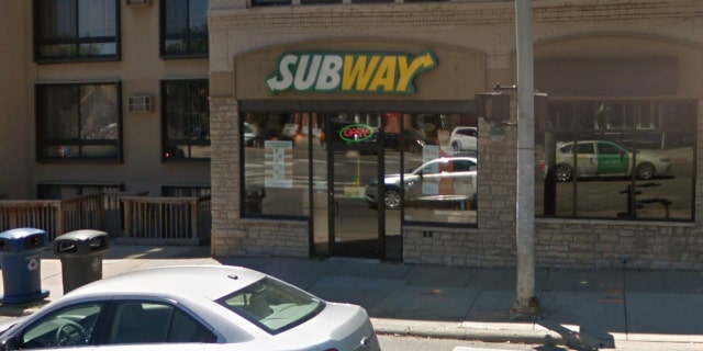 A Subway employee in Michigan was photographed with her bare feet on the counter near the food.
