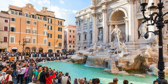 The Trevi fountain, commissioned by Pope Clement X11 in 1732, is visited by millions of tourists every year. (istock)