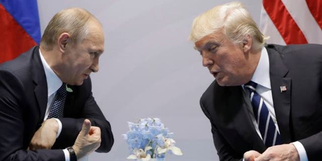 President Donald Trump meets with Russian President Vladimir Putin at the G20 Summit, Friday, July 7, 2017, in Hamburg. (AP Photo/Evan Vucci) 