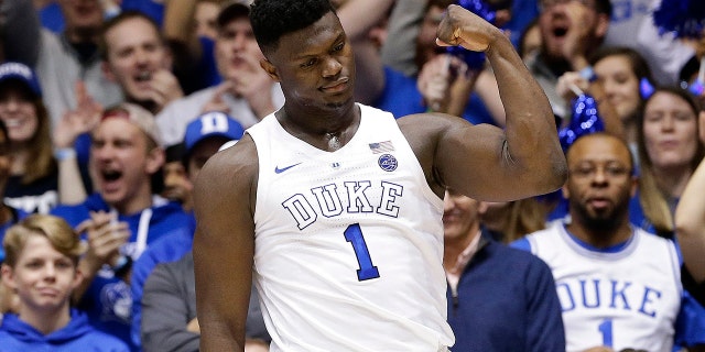 Duke's Zion Williamson (1) reacts following a basket against Virginia during the first half of an NCAA college basketball game in Durham, N.C., Saturday, Jan. 19, 2019. (AP Photo/Gerry Broome)