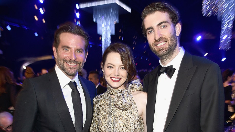 LOS ANGELES, CA - JANUARY 27: (L-R) Bradley Cooper, Emma Stone, and Dave McCary during the 25th Annual Screen Actors Guild Awards at The Shrine Auditorium on January 27, 2019 in Los Angeles, California. 480595 (Photo by Dimitrios Kambouris/Getty Images for Turner)