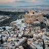 Snow covers parts of the ancient Acropolis hill and Plaka the tourist district of Athens, Jan. 8, 2019. 
