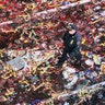 A police officer walks through debris following New Year's Eve celebrations in Times Square in New York City, January 1, 2019.