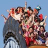 Kimono-clad women celebrating turning 20 years old ride a roller coaster following a coming of age ceremony at Toshimaen amusement park in Tokyo, Jan. 14, 2019.