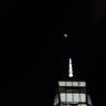 Photographers in New York City braved sub-zero temperatures to capture images of the super blood Moon.