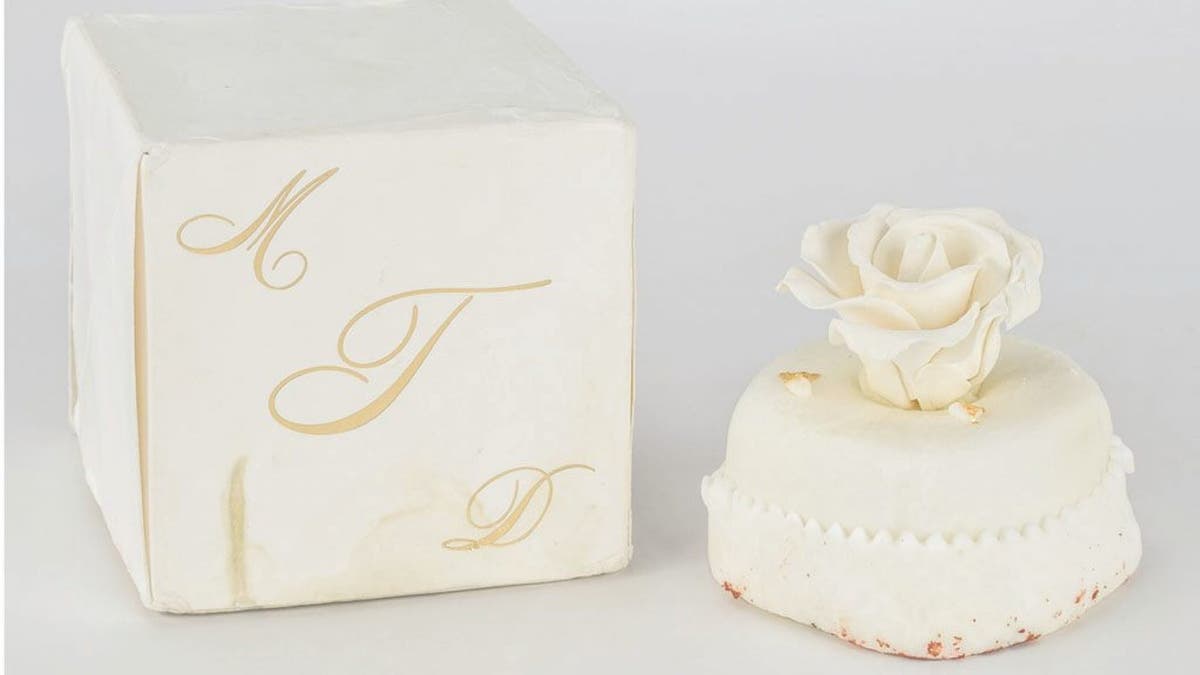 The 14-year-old sweet for sale comes packaged in its original ivory box, stamped with a gold monogram “MDT.”