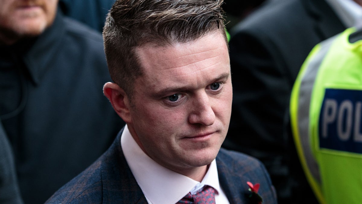 Far-right figurehead Tommy Robinson, real name Stephen Yaxley-Lennon, leaves the Old Bailey on October 23, 2018, in London. 