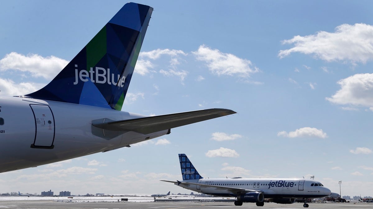 Jet Blue airplanes on the tarmac at John F. Kennedy International Airport in New York. (Associated Press)
