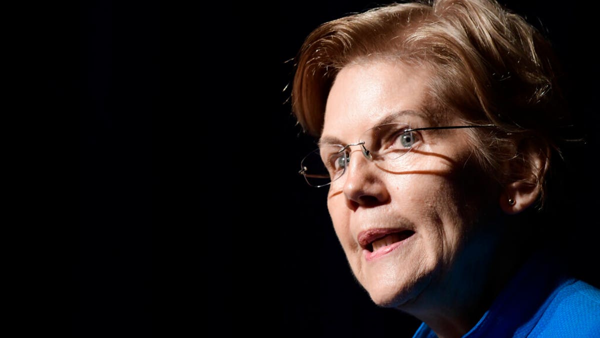 Elizabeth Warren, United States senator from Massachusetts and one of the many Democrats running for president in 2020, speaks at the "Community Conversation about Puerto Rico and its Recovery" held at the Alejandro Tapia y Rivera Theater, in San Juan, Puerto Rico, Tuesday Jan. 22, 2019. Warren addressed the hardships Puerto Rico has endured in the past two years, particularly its debt crisis and the recovery in the aftermath of Hurricane Maria. (AP Photo/Carlos Giusti)