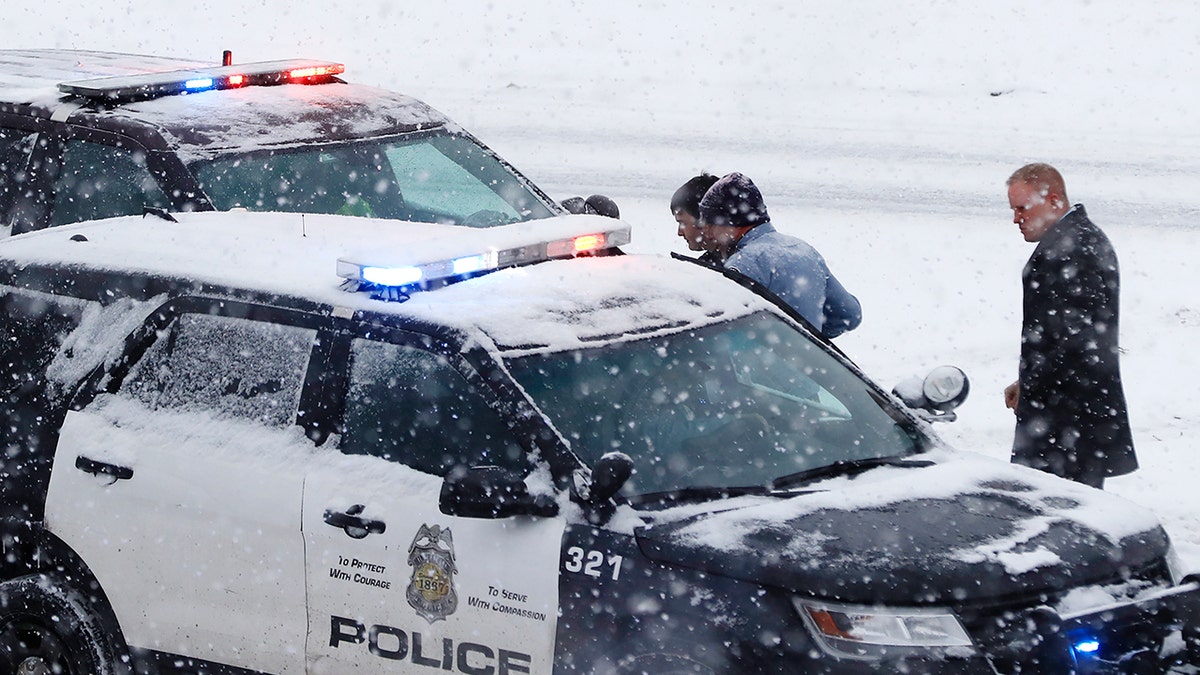 A person of interest was taken into custody after a school bus driver was shot where Interstate 35W and 94 run together near downtown Minneapolis Tuesday, Feb. 5, 2019. (Richard Tsong-Taatarii/Star Tribune via AP)