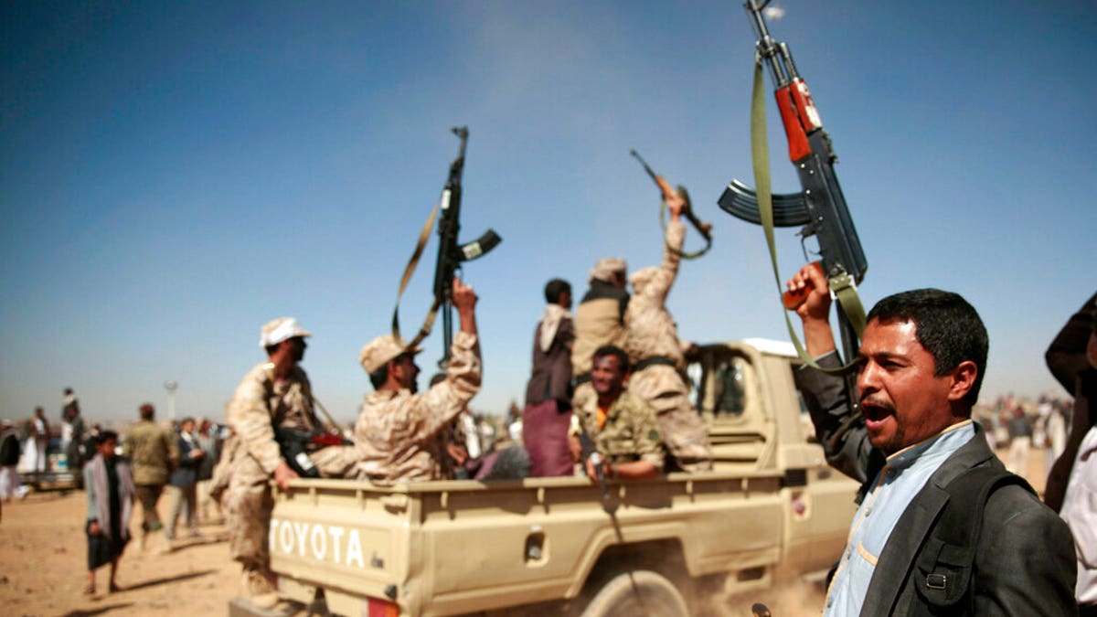 FILE - In this Jan. 3, 2017, file photo, tribesmen loyal to Houthi rebels chant slogans during a gathering aimed at mobilizing more fighters into battlefronts to fight pro-government forces, in Sanaa, Yemen. Moroccan government officials said last Thursday that Morocco has stopped taking part in military action with the Saudi-led coalition in Yemen’s war, and has recalled its ambassador to Saudi Arabia. (AP Photo/Hani Mohammed, File)