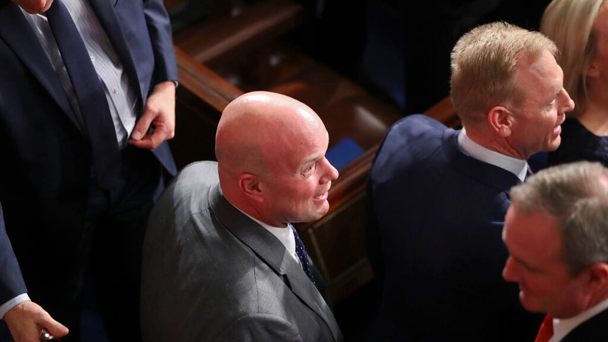 Acting Attorney General Matthew Whitaker, center, acting Secretary of Defense Patrick Shanahan, right, and members of President Donald Trump's cabinet at the State of the Union address Tuesday night. (AP Photo/Andrew Harnik)