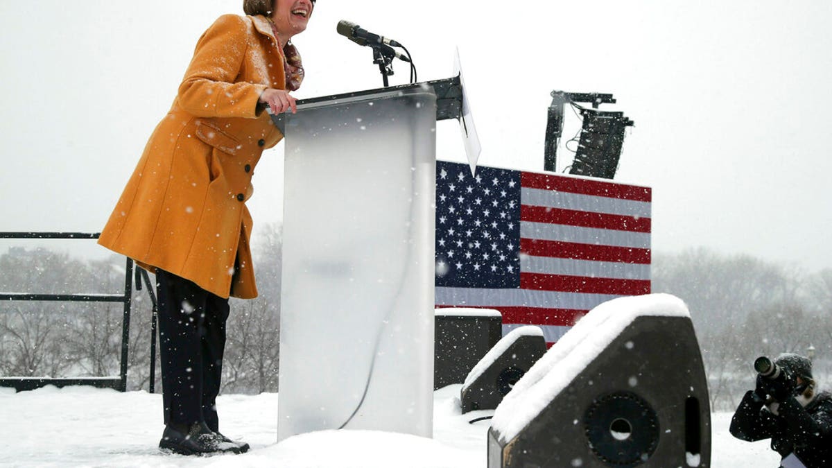 Democratic Sen. Amy Klobuchar at the snowy rally where she announced she was entering the race for president Sunday. (AP Photo/Jim Mone)