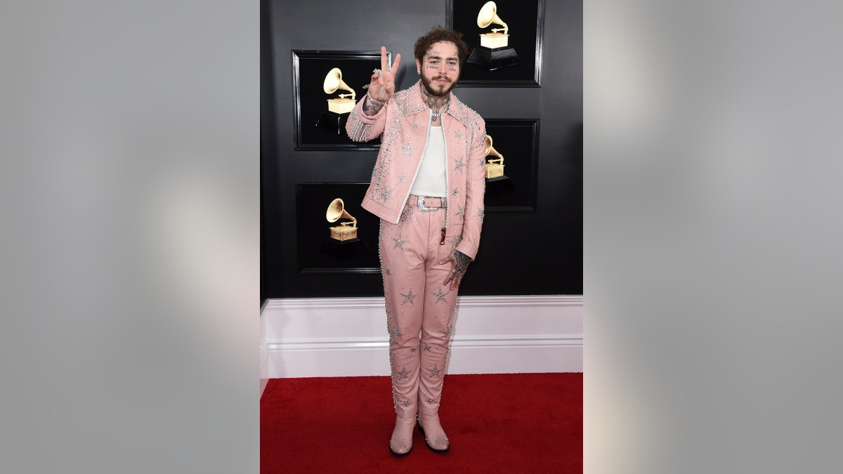 Post Malone arrives at the 61st annual Grammy Awards at the Staples Center on Sunday, Feb. 10, 2019, in Los Angeles.