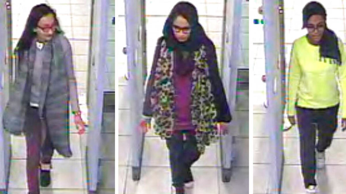 This Monday Feb. 23, 2015 file handout image of a three image combo of stills taken from CCTV issued by the Metropolitan Police shows Kadiza Sultana, left, Shamima Begum, center, and Amira Abase going through security at Gatwick airport, south England, before catching their flight to Turkey.