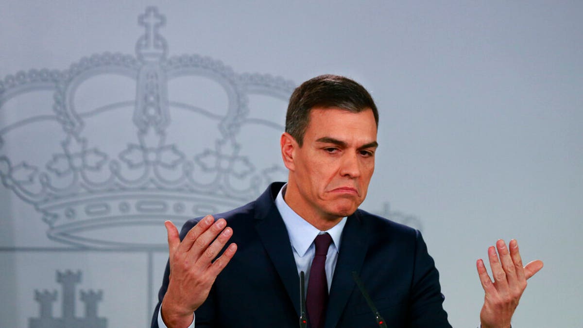 Spain's Prime Minister Pedro Sanchez delivers a statement at the Moncloa Palace in Madrid, Spain, Friday, Feb. 15, 2019. Sanchez has called early general elections for late April, the third such ballot in less than four years.