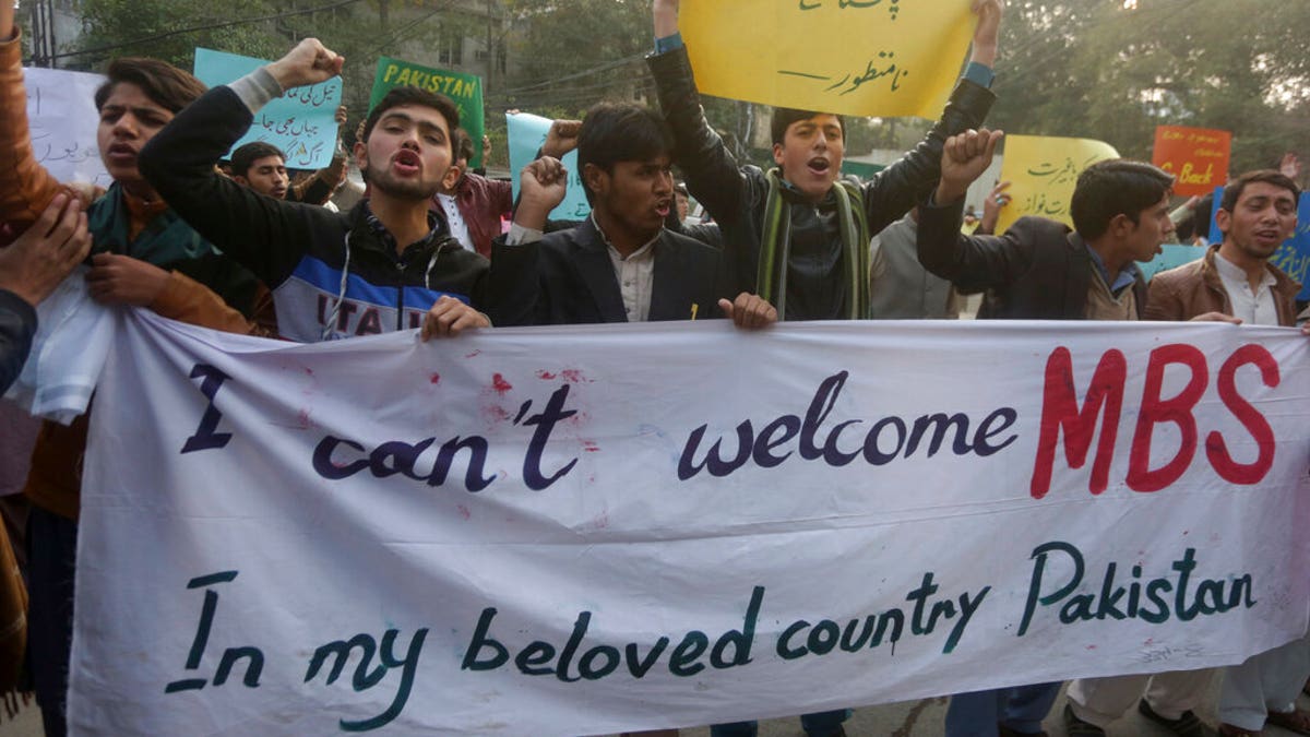 Pakistani protesters rally to condemn a visit of Saudi Arabia's Crown Prince to Pakistan, in Lahore, Pakistan, Friday, Feb. 15, 2019. Pakistan said Wednesday that Crown Prince Mohammed bin Salman will arrive in Islamabad later this week on an official visit that is expected to include the signing of agreements for billions of dollars of investment in Pakistan. (AP Photo/K.M. Chaudary)