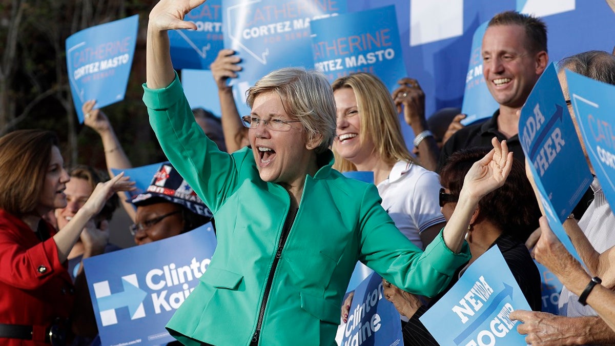 FILE - Sen. Elizabeth Warren, D-Mass., was briefly heckled during a campaign rally in Georgia over her Native American ancestry claims. (AP Photo/John Locher, File)