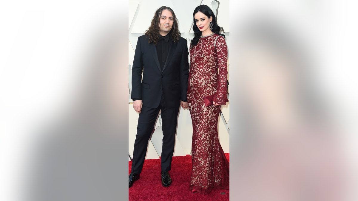 Krysten Ritter, right, and Adam Granduciel arrive at the Oscars on Sunday, Feb. 24, 2019, at the Dolby Theatre in Los Angeles. (Photo by Jordan Strauss/Invision/AP)