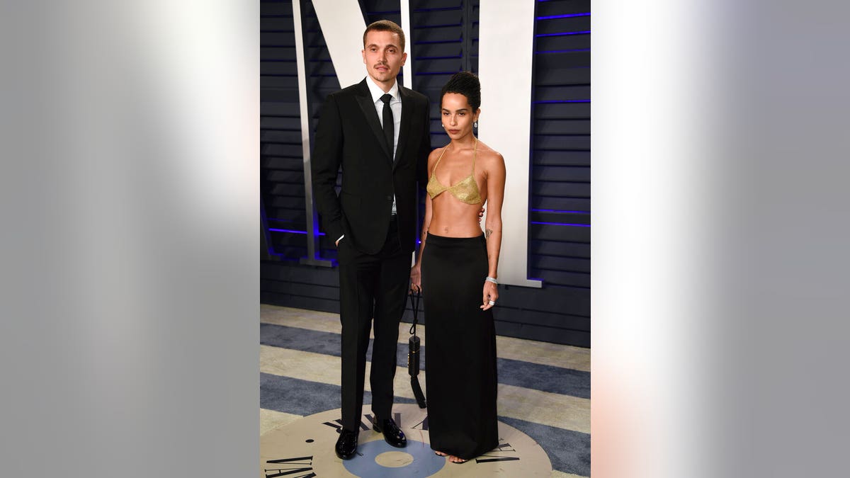 Zoe Kravitz and Karl Glusman arrive at the 2019 Vanity Fair Oscars Party.