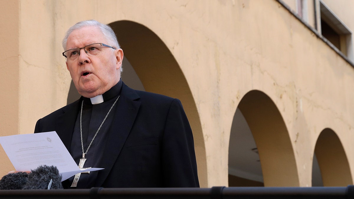 Brisbane's Archbishop Mark Coleridge reads a statement to the media on the conviction of Australian Cardinal George Pell for molesting two choir boys in the 1970s, in Rome, Tuesday, Feb. 26, 2019. The most senior Catholic cleric ever charged with child sex abuse has been convicted of molesting two choirboys moments after celebrating Mass, dealing a new blow to the Catholic hierarchy's credibility after a year of global revelations of abuse and cover-up. (AP Photo/Alessandra Tarantino)