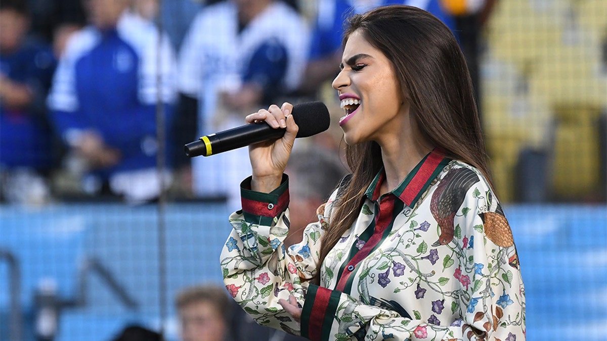 Antonella Barba sings the National Anthem before the game between the Los Angeles Dodgers and the Arizona Diamondbacks at Dodger Stadium on April 14, 2017 in Los Angeles, Calif.