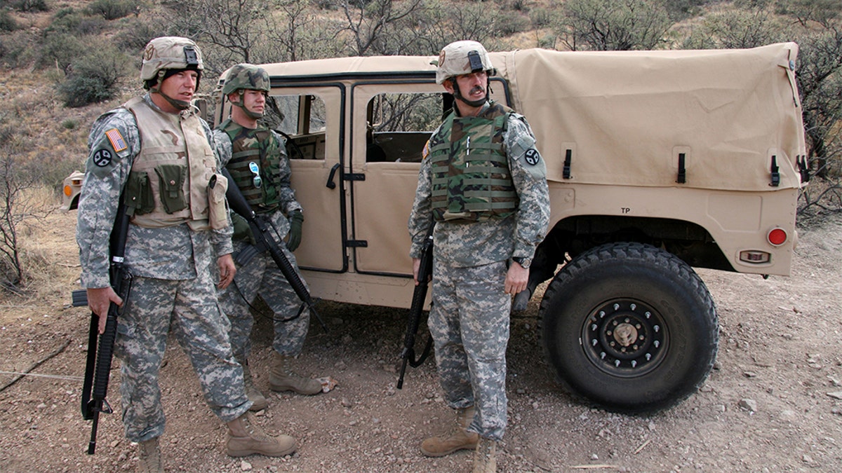 Soldiers from the Tennessee Army National Guard keep an eye out for signs of illegal activity along the U.S./Mexico border in the Sasabe District of Arizona. (Photo credit: Sgt. 1st Class Gordon Hyde)