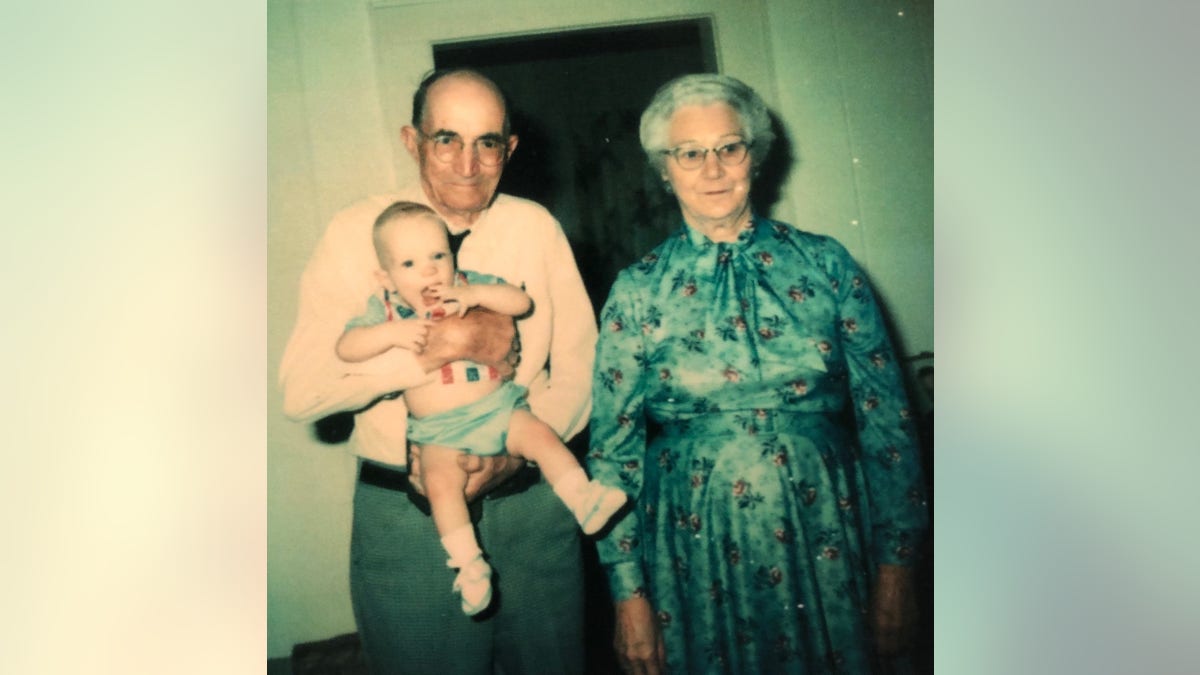An early picture of Brandon with his maternal grandparents.