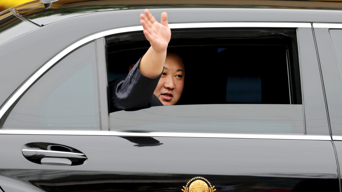 North Korean leader Kim Jong Un waves from a car after arriving by train in Dong Dang in a Vietnamese border town last month, ahead of his second summit with President Trump. (AP Photo/Minh Hoang)