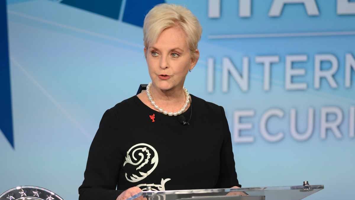 FILE - In this Nov. 17, 2018 file photo, Cindy McCain pauses while presenting the inaugural John McCain Prize for Leadership in Public Service to the People of the island of Lesbos, Greece at the Halifax International Security Forum in Halifax, Canada.