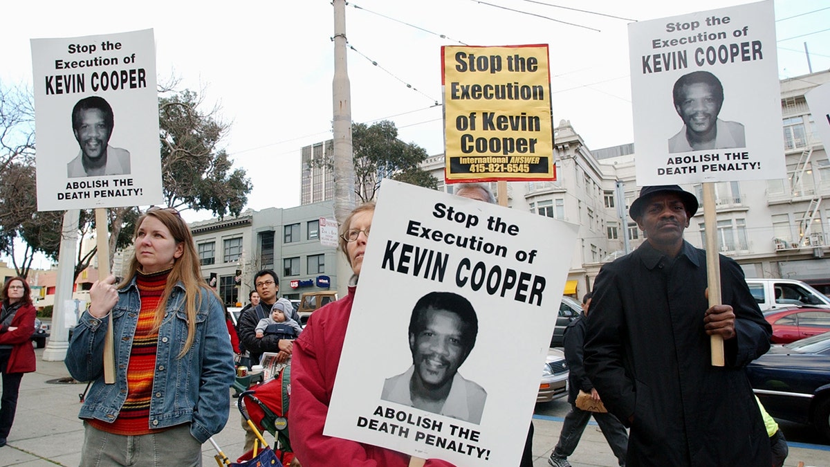 Protesters attend a rally in downtown San Francisco, Tuesday, Feb. 3, 2004, to denounce the Feb. 10 execution of Kevin Cooper at San Quentin State Penitentiary. Cooper was convicted of murdering two children and two adults in a Chino Hills home shortly after escaping from the California Institution for Men in nearby Chino in 1983.