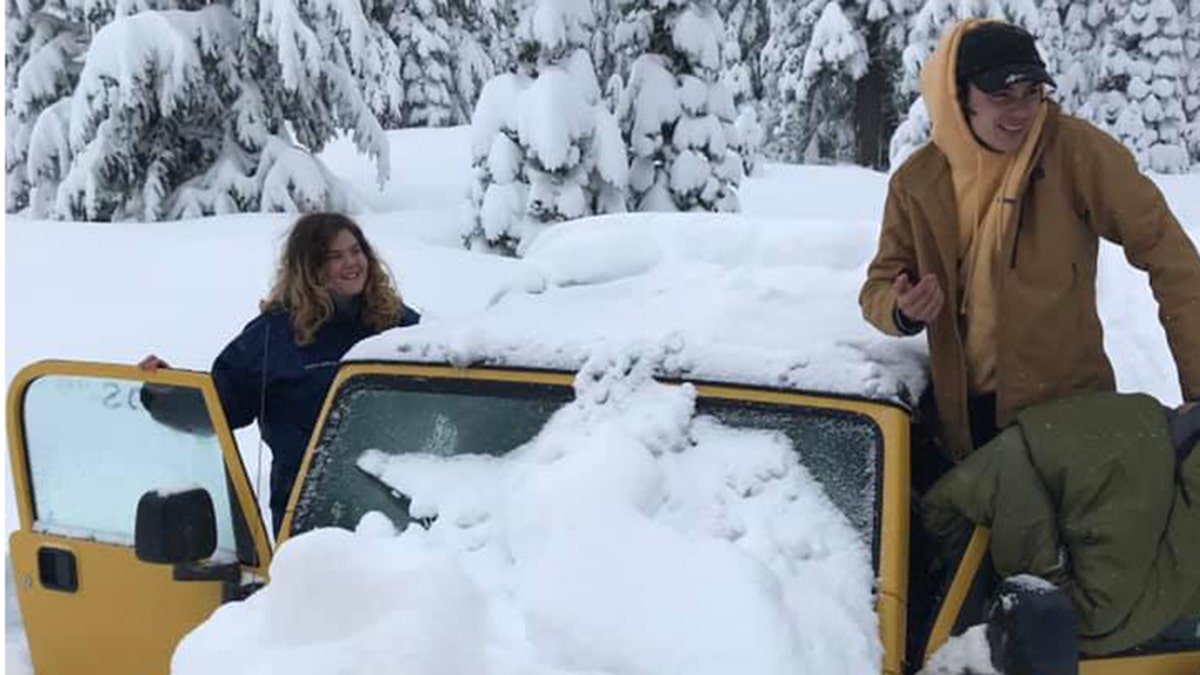 Carlos Hernandez-Isava and Maia Herman-Kitami were happy to be rescued after they were stranded in their Jeep for five days.