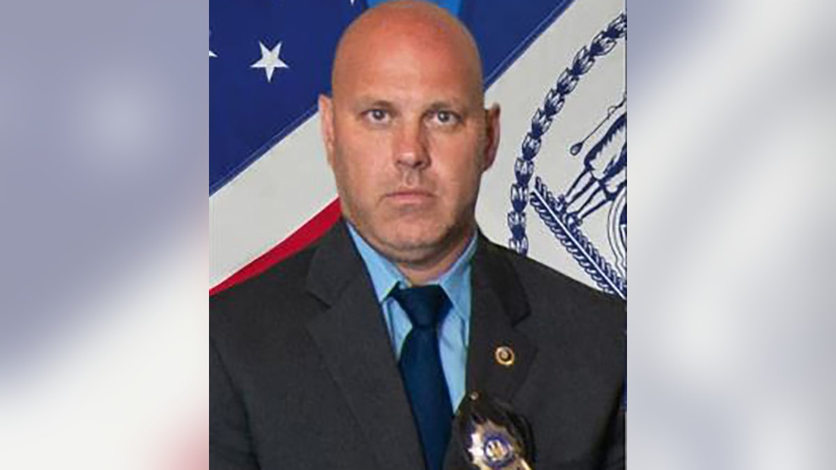 Det. Brian Simonsen was shot and killed by friendly fire during the armed robbery at a T-Mobile store in Queens, N.Y.