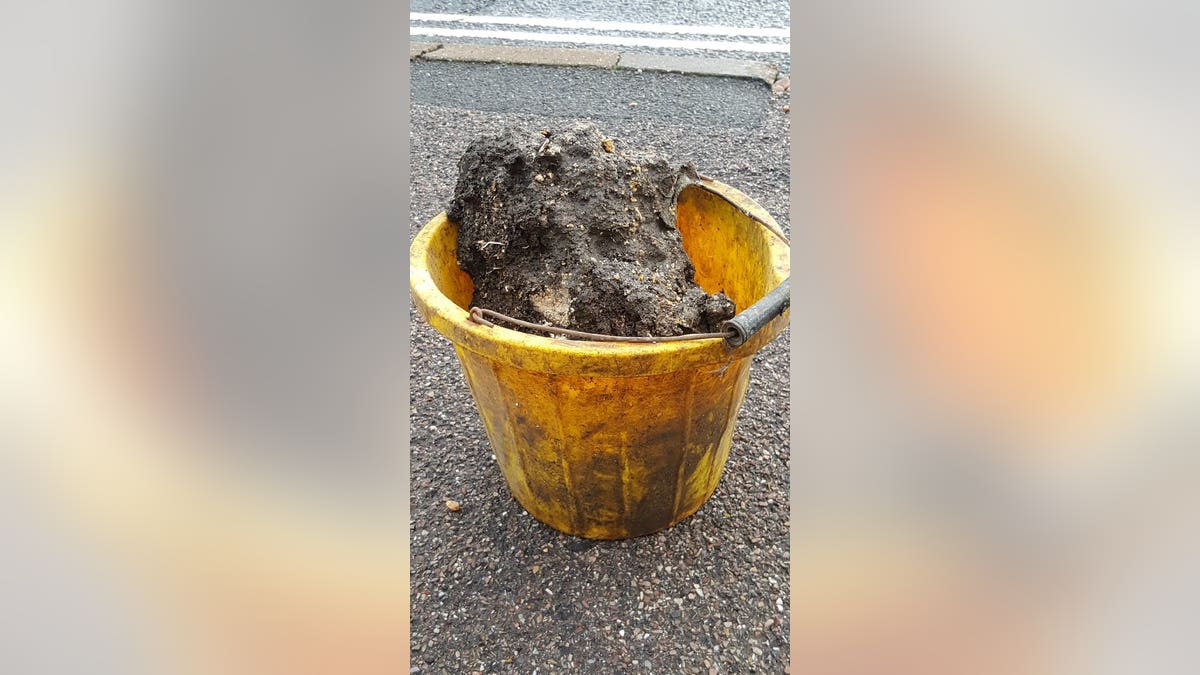 The first chuck of the 210-foot “fatberg” in Sidmouth, England was brought to the surface as sewer workers began their mammoth task of removing it.