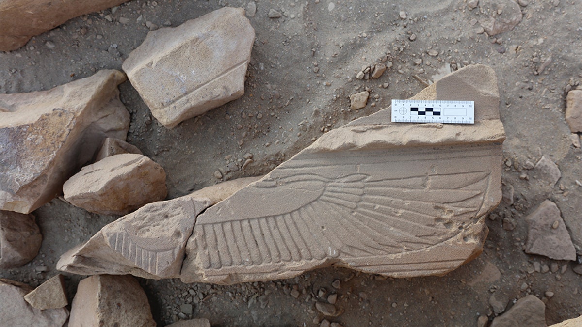 Fragment of a winged solar disk discovered in the ancient quarry. (Gebel el Silsila Project)