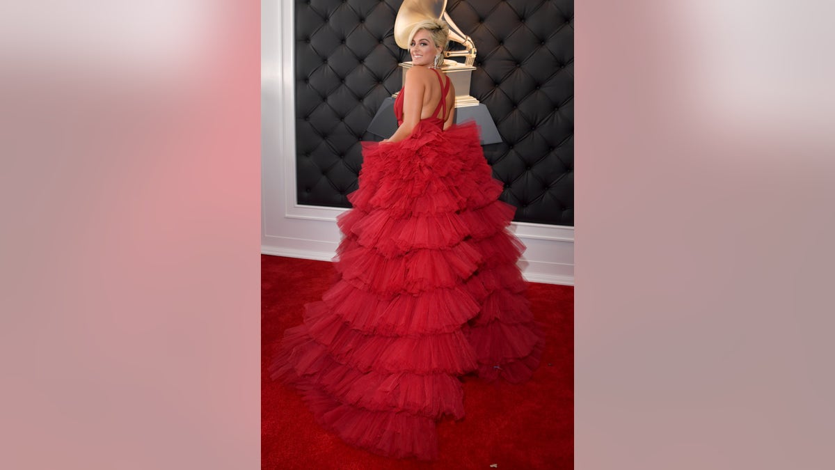 Bebe Rexha flaunts her curves at Grammys red carpet after designers refused  to dress her for being too big