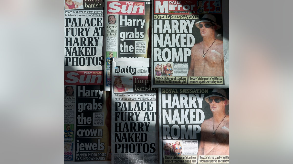 An arrangement of British daily newspapers photographed in London on August 23, 2012 shows the front-page headlines and stories regarding nude pictures of Britain's Prince Harry. The British royal family on August 23 warned the country's newspapers not to publish nude photographs of Prince Harry cavorting with friends on holiday in Las Vegas. Newspapers on Thursday adhered to the palace's request with The Mirror having "Harry naked romp" splashed across its front page while the Daily Mail ran with "Palace fury at Harry naked photos" as its main headline.