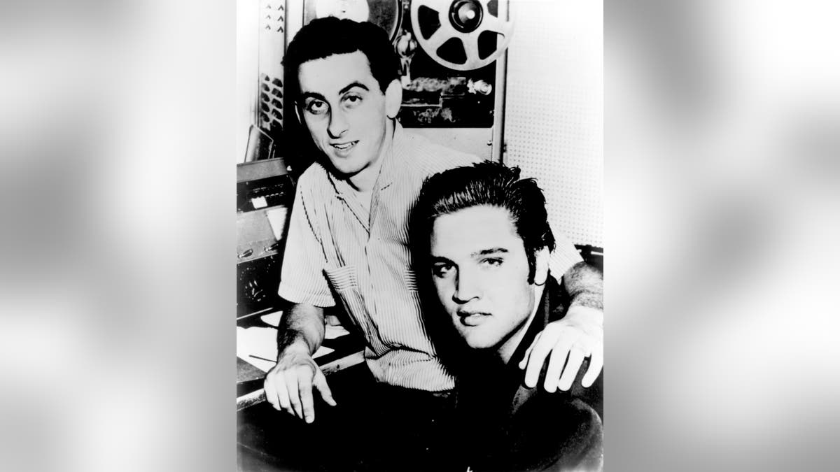 George Klein, pictured here with Elvis Presley, died at age 83.