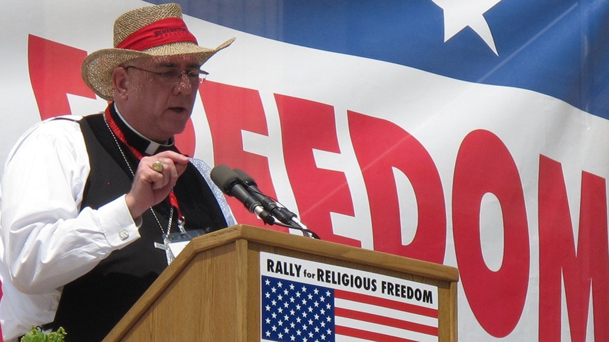 Roman Catholic Archbishop Joseph Naumann, of Kansas City, Kan., speaks during a rally in June 2012, in Topeka, Kansas.