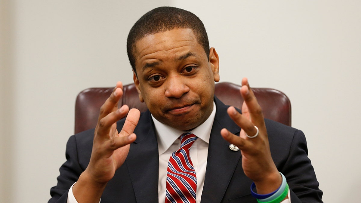 Virginia Lt. Gov. Justin Fairfax speaks during an interview in his office at the Capitol in Richmond, Va., on Saturday, Feb. 2, 2019. Fairfax answered questions about the controversial photo in Gov. Ralph Northam's yearbook page. (AP Photo/Steve Helber)