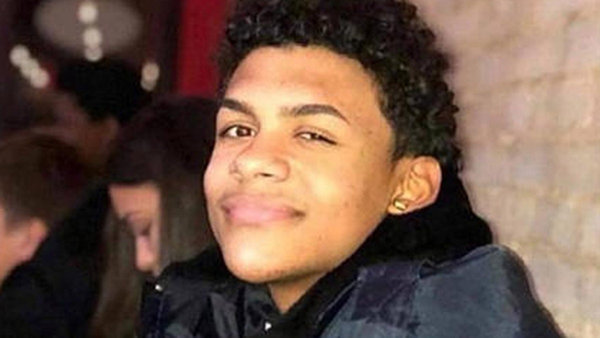 A suspect in the murder of Lesandro "Junior" Guzman-Feliz, pictured here, entered court on Monday holding a true-crime book about the murders of two prosecutors 