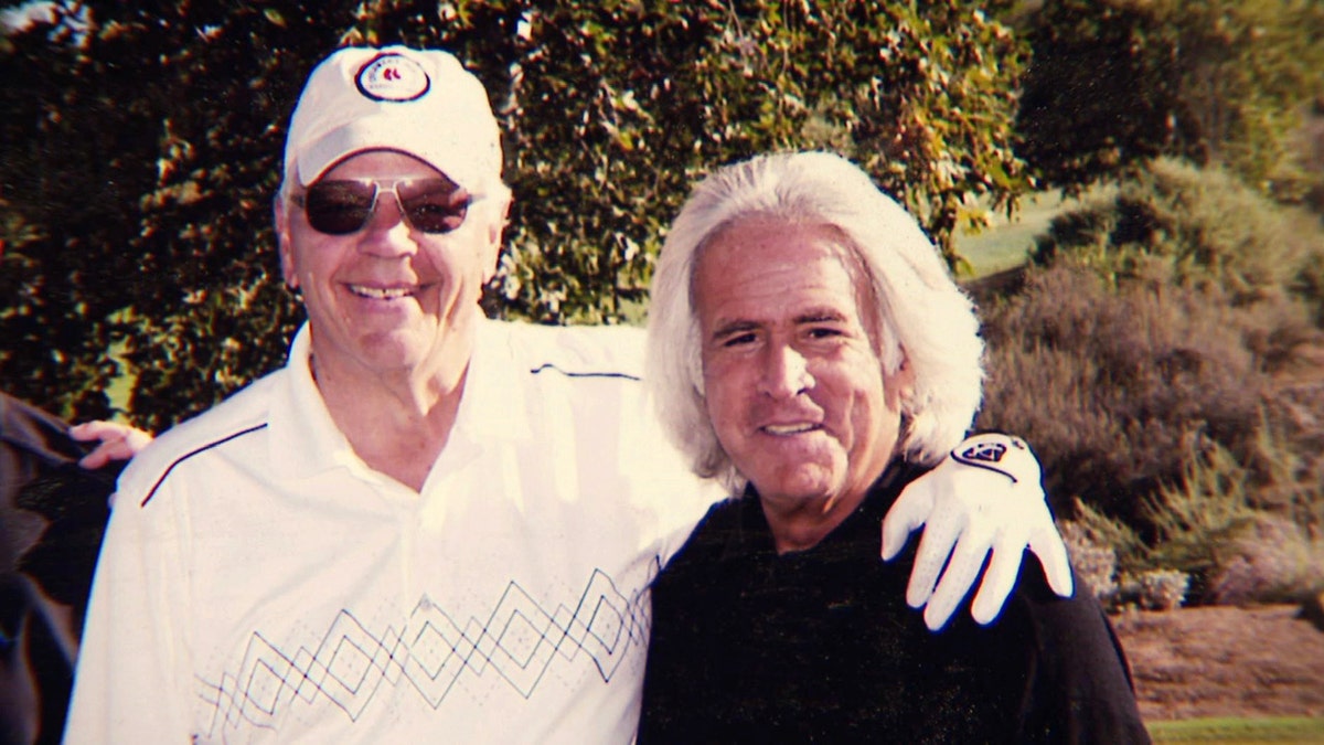 Bob Massi, right, poses with Fox News' Don Fair during a golf outing.