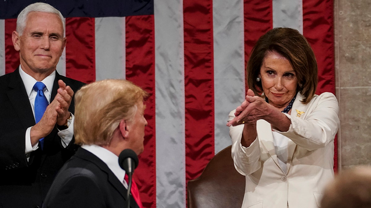 President Trump turns to House Speaker Nancy Pelosi as he delivers his State of the Union address to a joint session of Congress on Capitol Hill in Washington. (Doug Mills/The New York Times via AP, Pool)