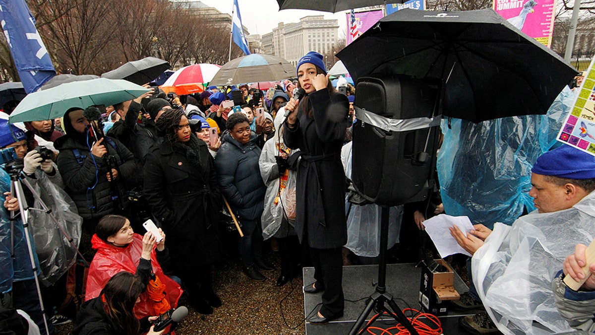 U.S. Rep. Alexandria Ocasio-Cortez (D-NY) addresses immigration rights activists during a rally calling for "permanent protections for Temporary Protected Status (TPS) holders" in front of the White House in Washington, U.S., February 12, 2019. REUTERS/Jim Bourg - RC13D2BE4BE0