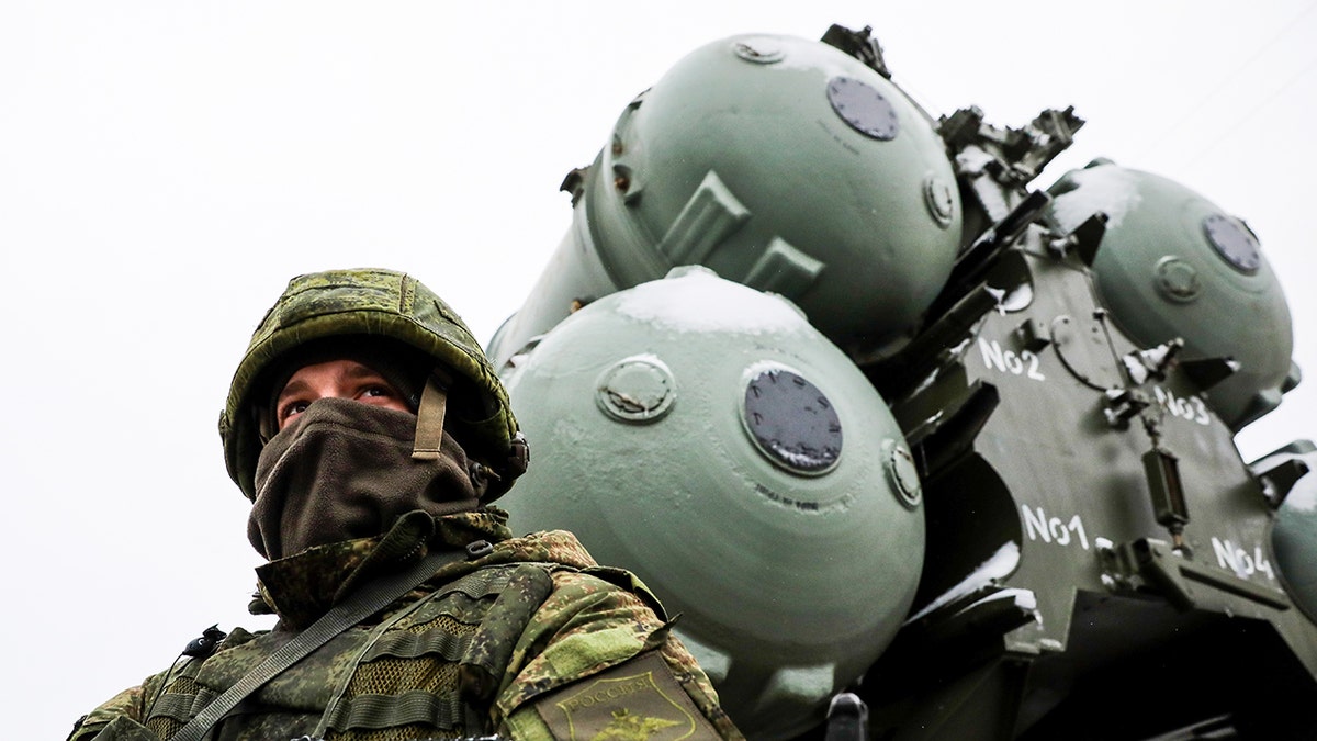 A serviceman of an S-400 Triumf missile system crew on standby as an anti-aircraft military unit of the Russian Air Force and the Russian Southern Military District enters combat duty near the Crimean town of Dzhankoy. 