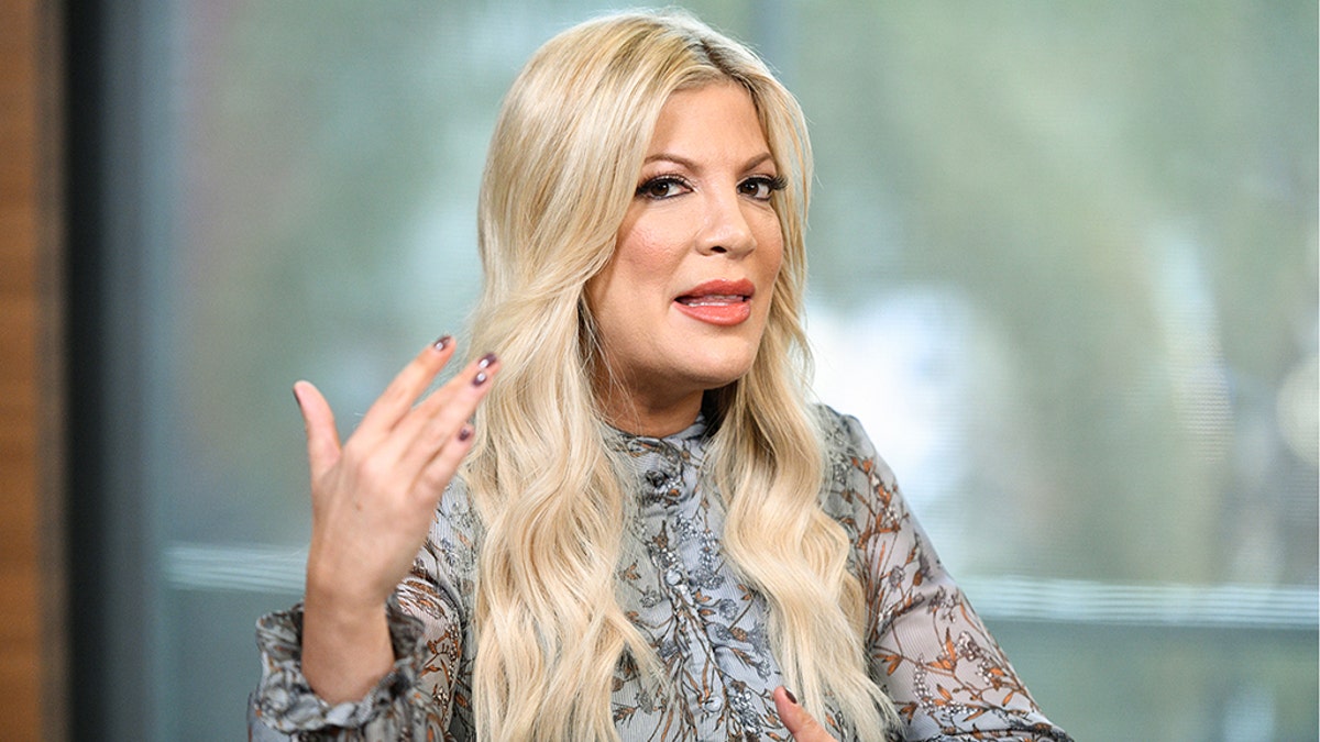 Tori Spelling, 48, reveals she's getting 'bigger' breast implants than size  D's & swears 'they'll actually look smaller