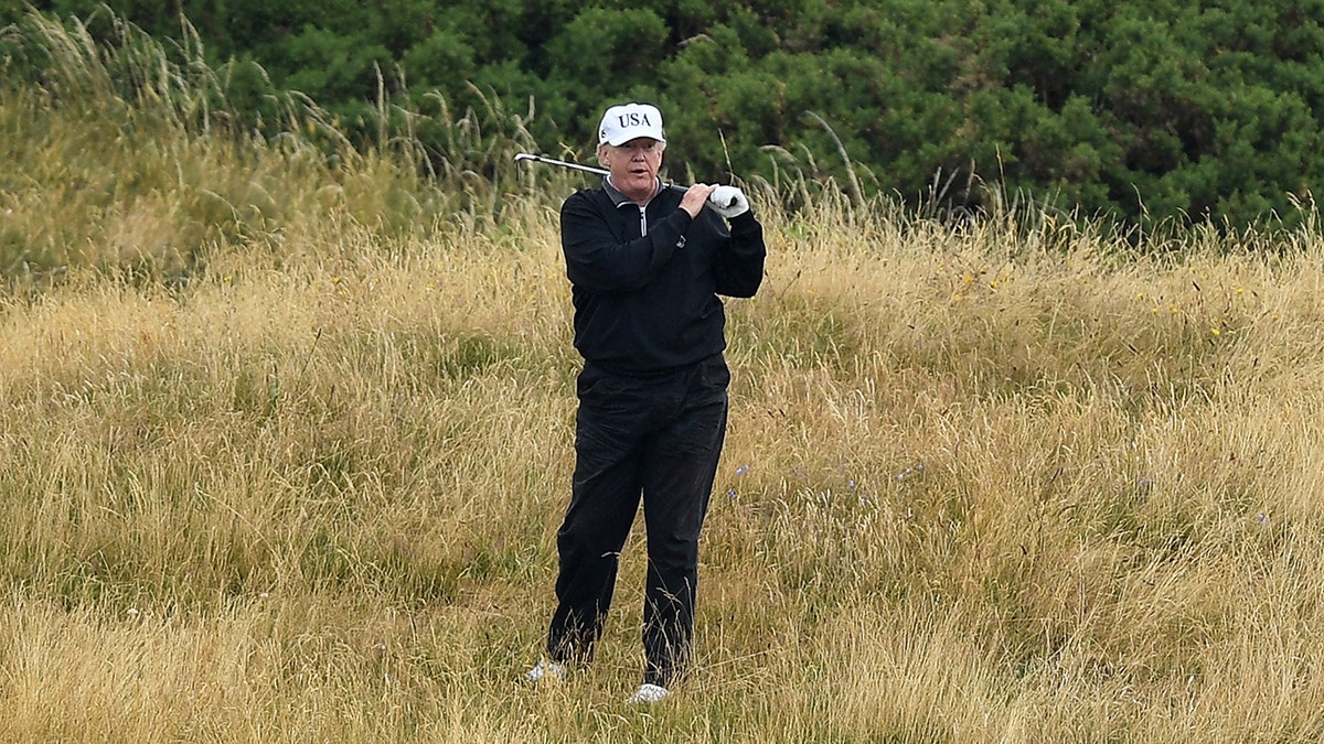 TURNBERRY, SCOTLAND - JULY 15: U.S. President Donald Trump plays a round of golf at Trump Turnberry Luxury Collection Resort during the U.S. President's first official visit to the United Kingdom on July 15, 2018 in Turnberry, Scotland. (Photo by Leon Neal/Getty Images)